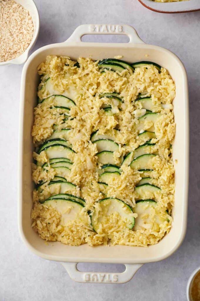 A baking dish of unbaked casserole.