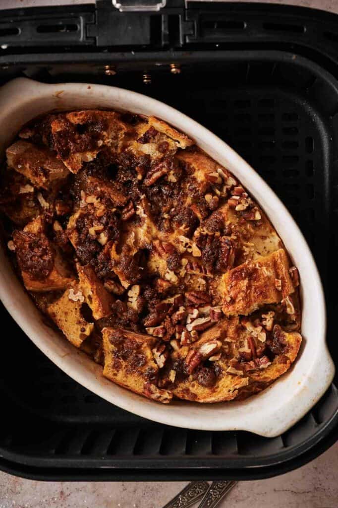 A dish of French toast casserole in an air fryer.
