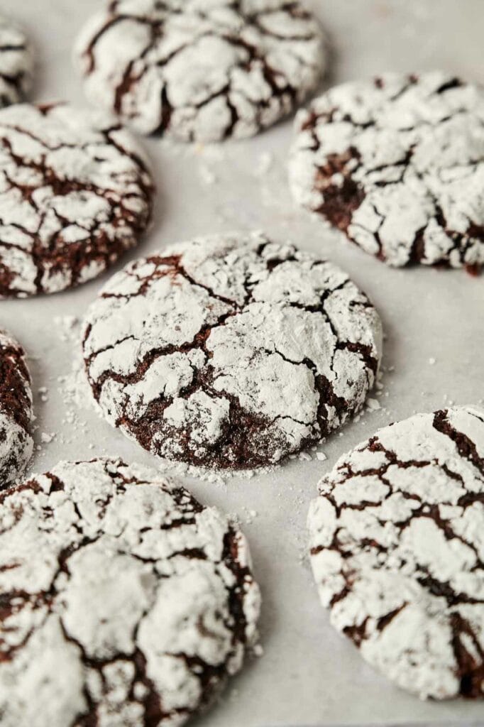 Chocolate crinkle cookies with powdered sugar.