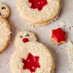 Snowman cookies with red and white frosting.