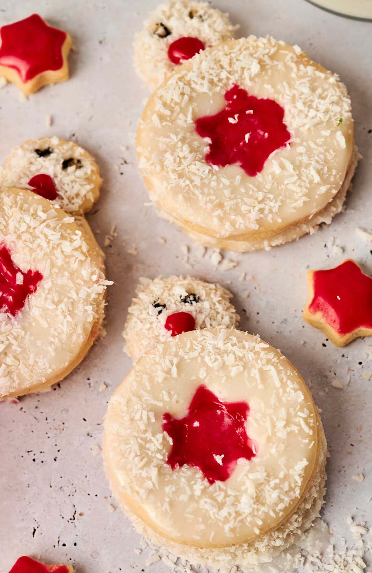 Snowman cookies with red and white icing.