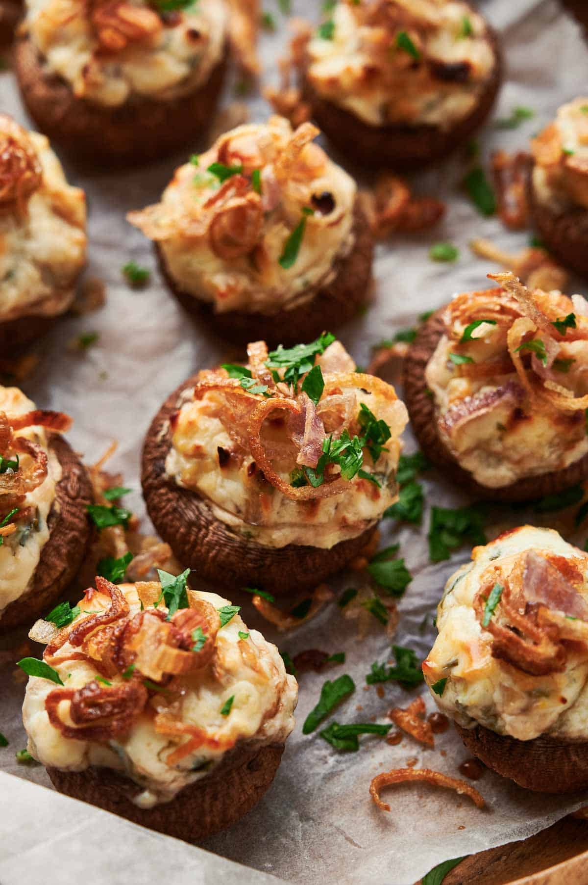 Stuffed mushrooms topped with onions and parmesan cheese.