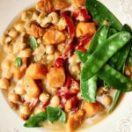 Thai yellow curry in a white bowl.