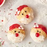 Santa whoopie pies on a white plate.