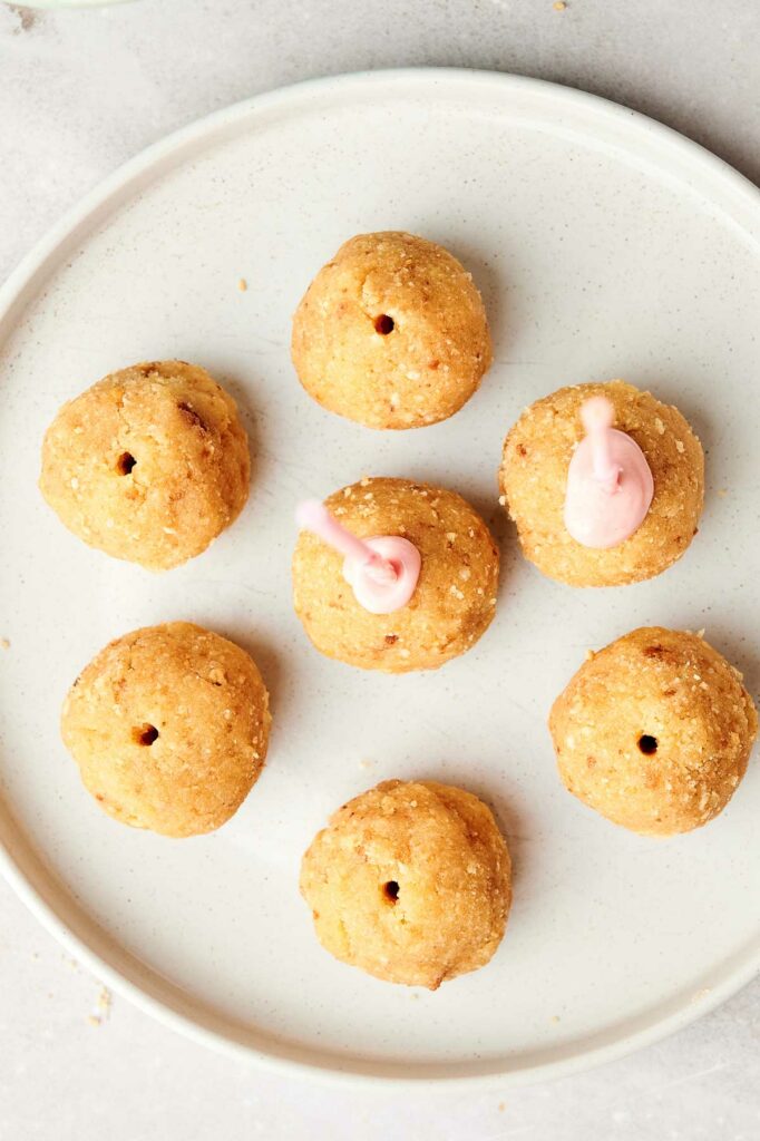 A plate with a bunch of donuts, Starbucks cake pops recipe.