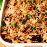 Wild rice casserole served in a white dish.