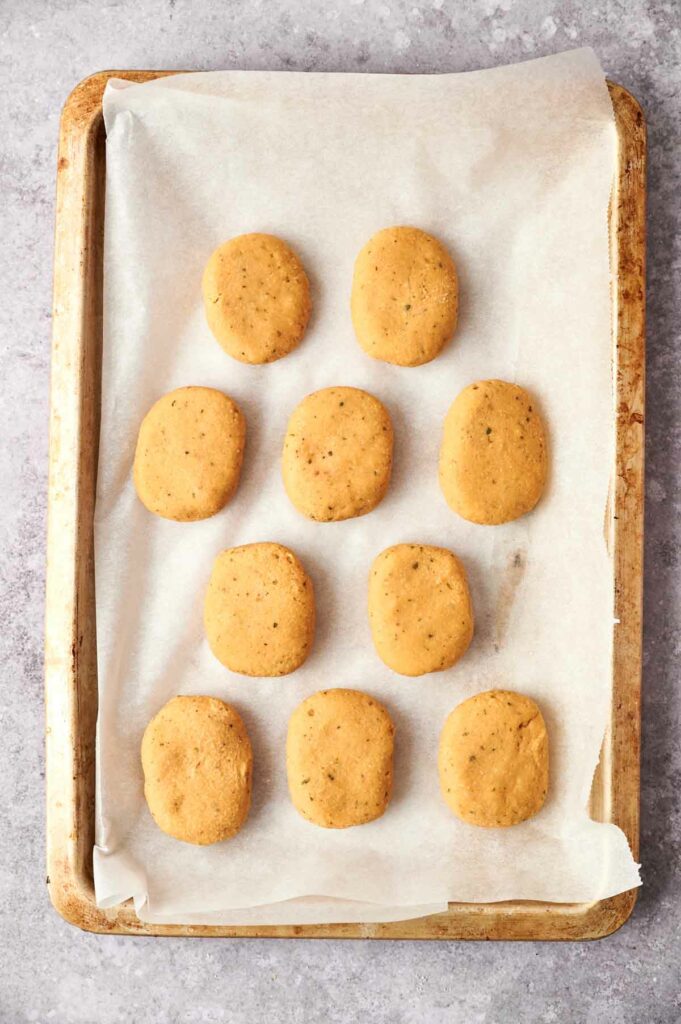 Chickpea nuggets on a baking sheet.
