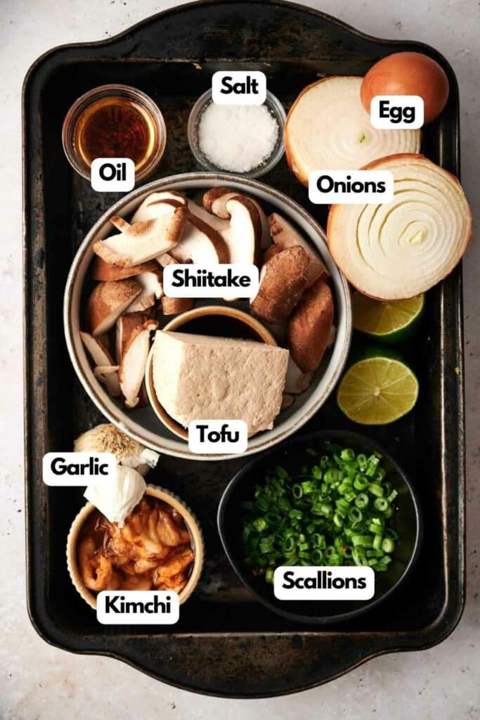 The ingredients for a Korean tofu soup are shown on a tray.