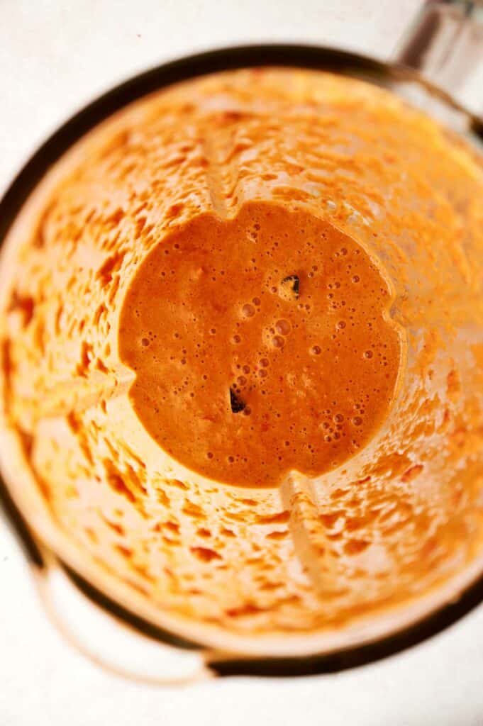 Top view of fresh Thai Red Curry Sauce in a blender.