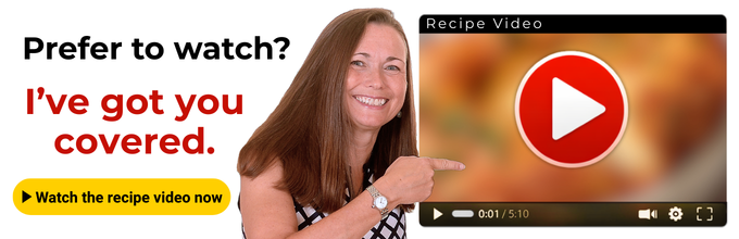 A woman smiles and points at a large play button on a video player graphic, with text offering to watch a recipe video instead of reading.