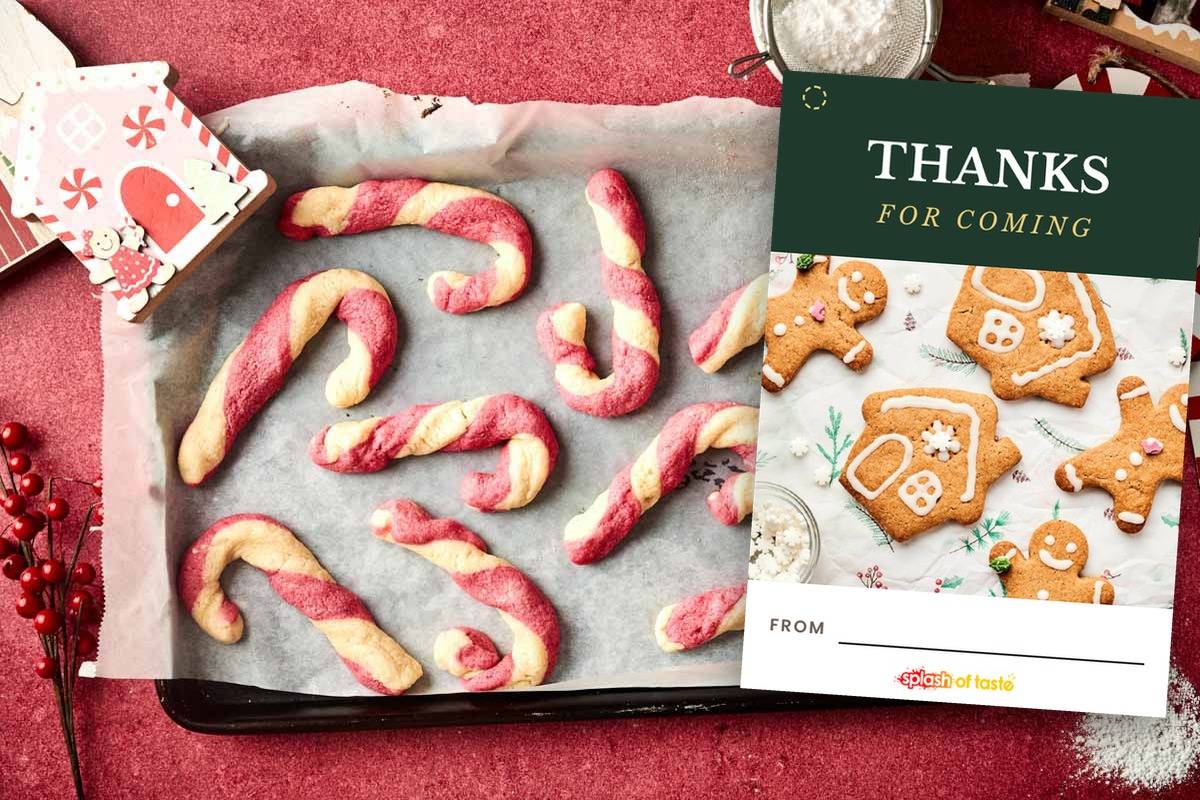 Candy cane cookies on a baking sheet beside a printable Thanks for Coming gift tag.